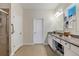 Bright bathroom with granite countertops, spacious vanity, and a glass-enclosed shower at 9157 Genesee St, Port Charlotte, FL 33981