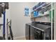 Laundry room with washer, dryer, and storage shelves at 9157 Genesee St, Port Charlotte, FL 33981