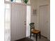 Bright entryway with a chair and double door closet at 97 Mariner Ln, Rotonda West, FL 33947