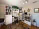 Home office with built-in shelving and keyboard at 97 Mariner Ln, Rotonda West, FL 33947