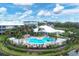 Aerial view of community pool with surrounding homes at 10390 Longshore Rd # 82, Placida, FL 33946