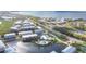 Community overview featuring waterfront property, pool, and various homes at 10390 Longshore Rd # 82, Placida, FL 33946