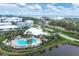 Wide aerial view of community and waterfront at 10390 Longshore Rd # 82, Placida, FL 33946