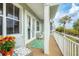 Relaxing balcony with seating and outdoor rug at 10390 Longshore Rd # 82, Placida, FL 33946