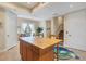 Butcher block kitchen island, hardwood floors, and access to a patio at 10390 Longshore Rd # 82, Placida, FL 33946