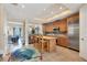 Open kitchen with butcher block island and stainless steel appliances at 10390 Longshore Rd # 82, Placida, FL 33946