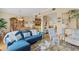 Open living space featuring comfortable seating, hardwood floors and coastal decor at 10390 Longshore Rd # 82, Placida, FL 33946