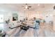 Bright and airy living room with open floor plan, showcasing neutral colored couches at 122 Glades Dr, Rotonda West, FL 33947