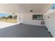 Carport area leading to the backyard at 1305 Rocky Creek Ln, Englewood, FL 34224