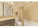 Clean bathroom with a tub, shower, and granite vanity at 13091 Creekside Ln, Port Charlotte, FL 33953