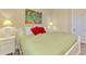 Bedroom with a queen-size bed, two nightstands, and a dresser at 13091 Creekside Ln, Port Charlotte, FL 33953