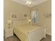 Light and airy bedroom with a comfortable queen-size bed and lovely decor at 13091 Creekside Ln, Port Charlotte, FL 33953