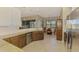 Updated kitchen with stainless steel appliances and a breakfast nook at 13091 Creekside Ln, Port Charlotte, FL 33953