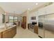 Modern kitchen with stainless steel appliances and granite countertops at 13091 Creekside Ln, Port Charlotte, FL 33953