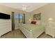 Spacious main bedroom with large window and ceiling fan at 13091 Creekside Ln, Port Charlotte, FL 33953