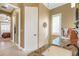 Bright bathroom with granite countertop, a view to the bedroom, and access to the shower at 14010 San Domingo Blvd, Port Charlotte, FL 33981
