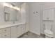 Bright bathroom with white cabinets and quartz countertop at 14311 Reserve Ct, Port Charlotte, FL 33953