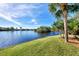 Enjoy breathtaking lake views from this beautiful waterfront property at 14311 Reserve Ct, Port Charlotte, FL 33953