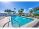 Inviting swimming pool with lounge chairs for relaxation at 14455 Worthwhile Rd, Port Charlotte, FL 33953