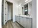 Modern bathroom with double vanity and a walk-in shower at 14681 Keystone Blvd, Port Charlotte, FL 33981