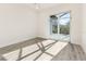 Bedroom with sliding glass doors leading to a private patio at 14681 Keystone Blvd, Port Charlotte, FL 33981