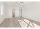 Bedroom with ceiling fan and access to bathroom and closet at 14681 Keystone Blvd, Port Charlotte, FL 33981