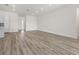 Bright and spacious living room with light wood-look flooring at 14681 Keystone Blvd, Port Charlotte, FL 33981