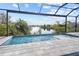 Screened pool and spa overlooking canal at 14681 Keystone Blvd, Port Charlotte, FL 33981
