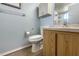 Bathroom with wood vanity, toilet, and shower/tub combo at 1515 Forrest Nelson Blvd # A 202, Port Charlotte, FL 33952