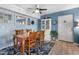 Dining area with wooden table and chairs, light blue walls at 1515 Forrest Nelson Blvd # A 202, Port Charlotte, FL 33952