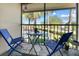 Screened porch with patio furniture, offering relaxing outdoor space at 1515 Forrest Nelson Blvd # A 202, Port Charlotte, FL 33952