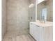 Bathroom with double vanity and large shower at 15384 Hennipen Cir, Port Charlotte, FL 33981
