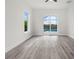 Bright bedroom with sliding glass doors leading to a pool at 15384 Hennipen Cir, Port Charlotte, FL 33981