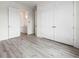 Bedroom with double doors and en-suite bathroom at 15384 Hennipen Cir, Port Charlotte, FL 33981