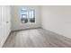 Bedroom with large windows and vinyl flooring at 15384 Hennipen Cir, Port Charlotte, FL 33981