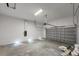 Unfinished garage with ample storage space at 15384 Hennipen Cir, Port Charlotte, FL 33981