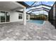 Spacious pool area with covered lanai at 15384 Hennipen Cir, Port Charlotte, FL 33981
