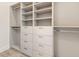 Large walk-in closet with shelves and drawers at 15384 Hennipen Cir, Port Charlotte, FL 33981