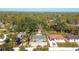 Aerial view showcasing a teal home's location in a residential neighborhood at 1570 Virginia Ln, Englewood, FL 34223