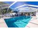 Large screened pool with ample deck space at 18497 Kuldin Ave, Port Charlotte, FL 33948