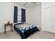 Guest bedroom with double bed and window coverings at 19584 Fishhawk Trl, Venice, FL 34293