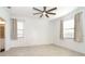 Bright bedroom with ceiling fan and neutral decor at 19584 Fishhawk Trl, Venice, FL 34293