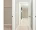 Hallway with access to bedroom, bathroom and closet at 19584 Fishhawk Trl, Venice, FL 34293