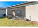Screened patio with access to the backyard at 19584 Fishhawk Trl, Venice, FL 34293