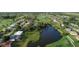 Aerial view of waterfront homes and golf course community at 229 Medalist Rd, Rotonda West, FL 33947