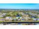 Aerial view of community near golf course at 229 Medalist Rd, Rotonda West, FL 33947