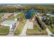 An aerial view of a waterfront property with canal access at 2495 Tenth St, Englewood, FL 34224