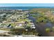 Aerial view of waterfront property with private dock and boat access at 2495 Tenth St, Englewood, FL 34224