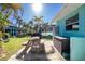Spacious backyard with picnic table, shed, and grill at 2495 Tenth St, Englewood, FL 34224