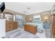 Spacious Primary bedroom with large bed and ample furniture at 2495 Tenth St, Englewood, FL 34224